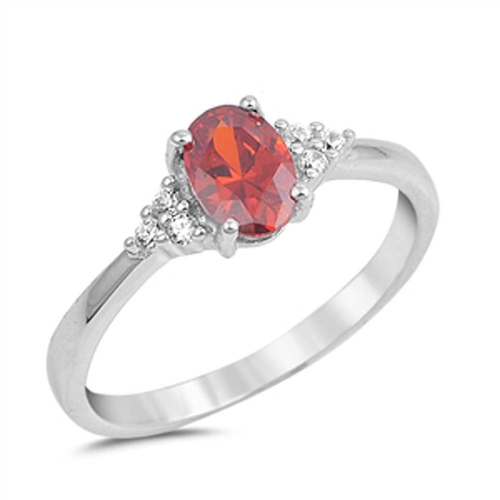 Sterling Silver Clear CZ Fancy Ring with a 4 Prong Set Oval Cut Garnet CZ in the CenterAnd Ring Face Height of 7MM