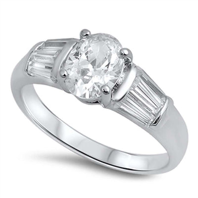 Sterling Silver Stylish Oval Cut Clear Cz Ring with Baguette Cz on Both SidesAnd Face Height of 8MM