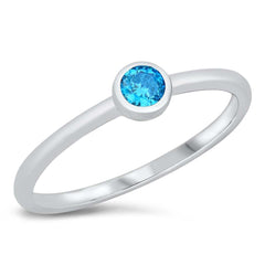 Sterling Silver Rhodium Plated Little Solitaire Blue Topaz CZ Ring