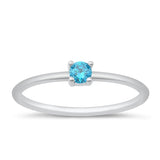 Sterling Silver Rhodium Plated Blue Topaz CZ Ring