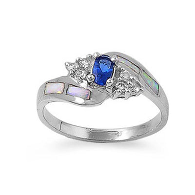 Sterling Silver Fancy Design Centered Blue Sapphire Oval Cut with Clear CZ and White Lab Opal Inlay Bypass Band RingAnd Face Height of 9MM