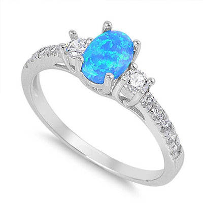 Sterling Silver Elegant Design Three Stone Oval Cut Blue Lab Opal and Round Clear CZ Inlay with Clear CZ RingAnd Face Height of 6MM