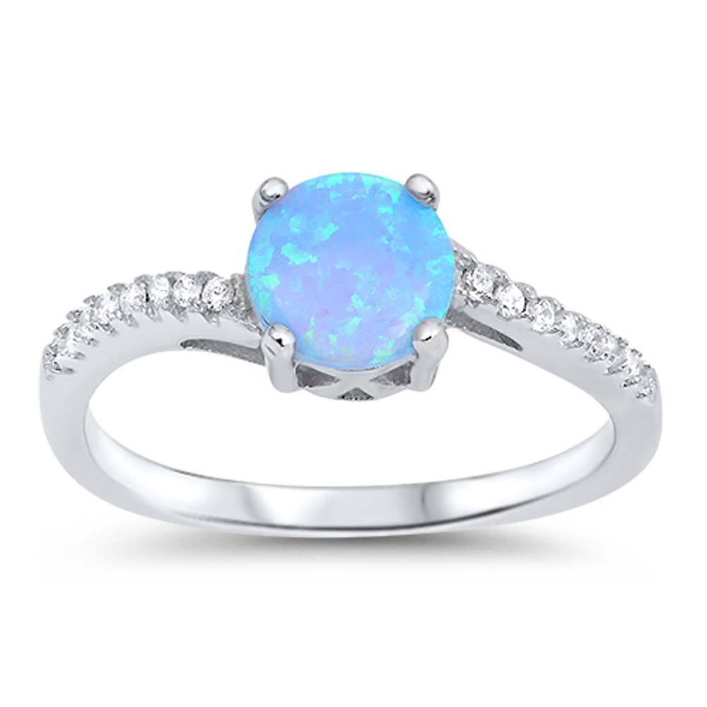 Sterling Silver Ring With White Lab Opal Center and Clear CZ StonesAnd Face Height of 7 MM\r\nFace Height of 7 mm