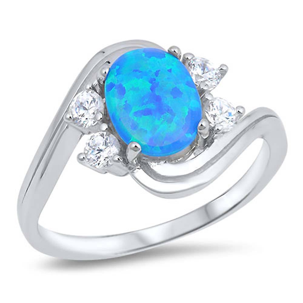 Sterling Silver Ring with round Blue Lab OpalAnd Cemter and Four Clear CZsAnd \r\nFace Height of 11 mm