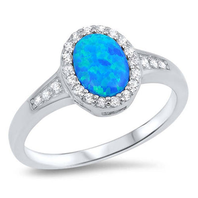 Sterling Silver Ring with Oval Blue Lab Opal Center and Clear CZsAnd Face Height of 11 mm