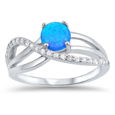 Sterling Silver Ring with Oval Blue Lab Opal Center and  Clear CZ Cross Over DesignAnd\r\nFace Height of 9 mm