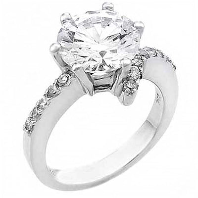 Sterling Silver Ladies Fashionable Ring with Pave Set Cz and Prong Set CzAnd Ring Width of 7MM
