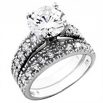 Sterling Silver Round Cz Wedding Ring Set with a Prong Set Cz in the CenterAnd Ring Width of 10MM