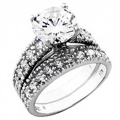 Sterling Silver Round Cz Wedding Ring Set with a Prong Set Cz in the CenterAnd Ring Width of 10MM