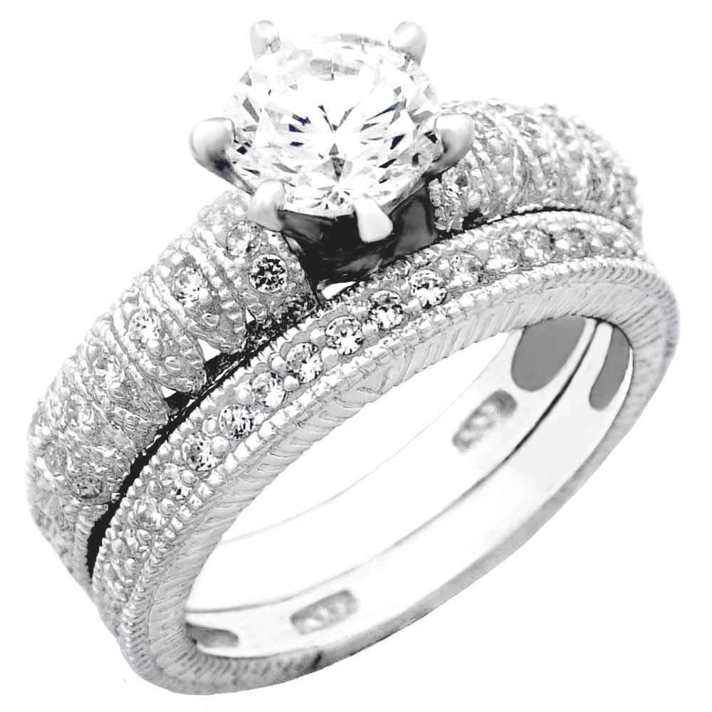 Sterling Silver Pave Set Cz Wedding Ring Set with a Prong Set Cz in the CenterAnd Ring Width of 9MM