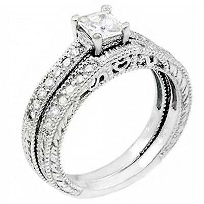 Sterling Silver Pave Set Round Cz Wedding Ring Set with a Prong Set Cz in the CenterAnd Ring Width of 8MM