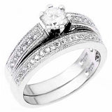 Sterling Silver Pave Set Cz Wedding Ring Set with a Prong Set Cz in the CenterAnd Ring Width of 8.5MM