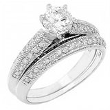 Sterling Silver Pave Set Cz Wedding Ring Set with a Prong Set Cz in the CenterAnd Ring Width of 8MM