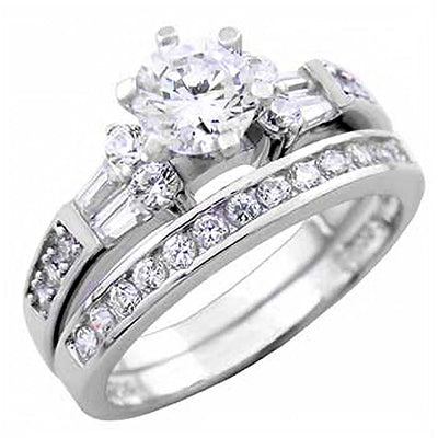 Sterling Silver Round and Trapezium Cz Engagement Ring Set with a 5MM Prong Set Cz in the CenterAnd Ring Width of 8MM