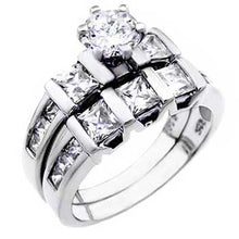 Load image into Gallery viewer, Sterling Silver Princess Cut Cz Ring Set with a 6MM Prong Set Round Cut Cz in the CenterAnd Ring Width of 10MM