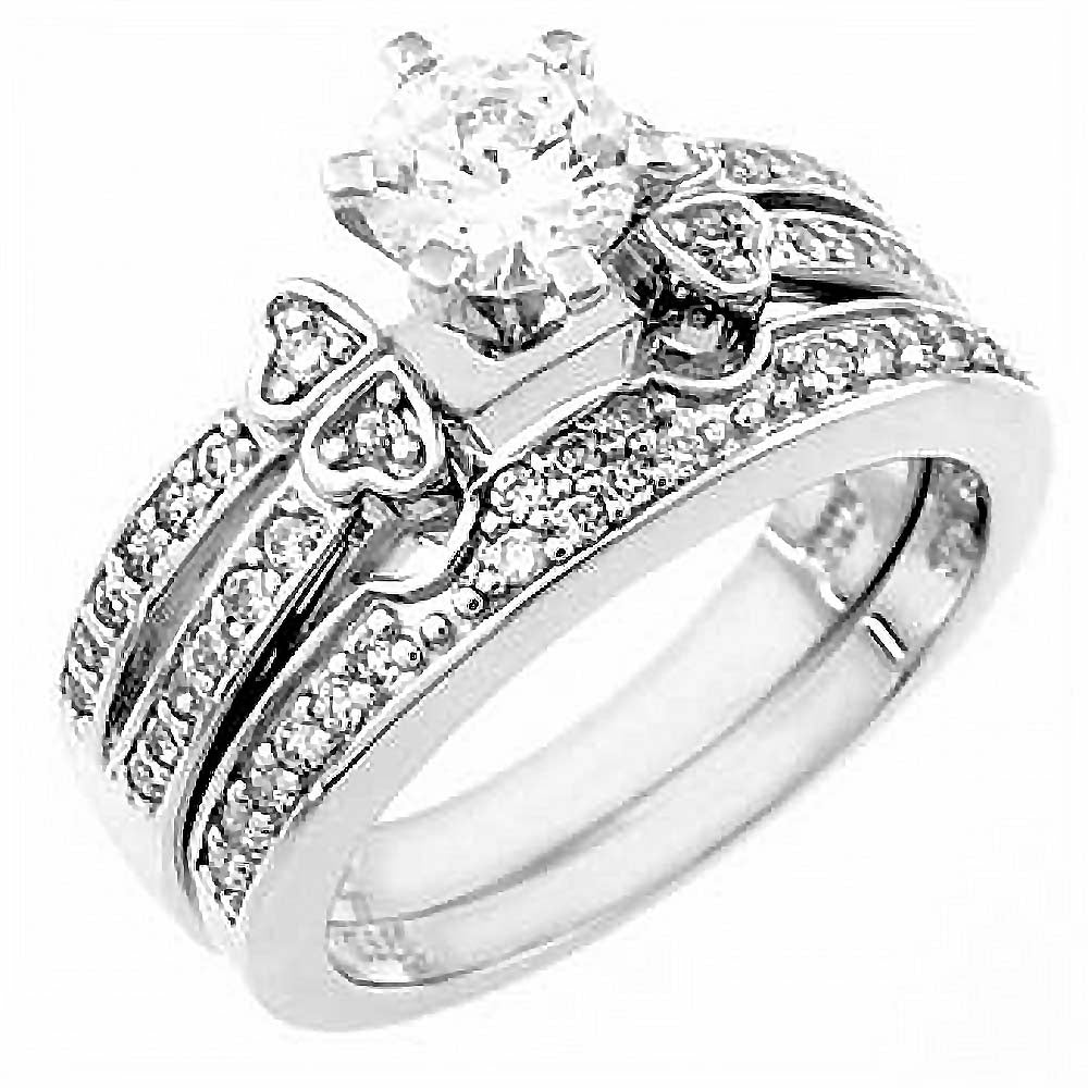 Sterling Silver Round Cz Wedding Ring Set with a Prong Set Cz in the CenterAnd Ring Width of 9MM