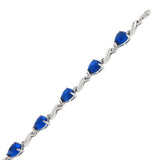 Sterling Silver Pear Shape Blue Spinel Stone Rhodium BraceletAnd Length 1/2 inchesAnd Width 7.4mm